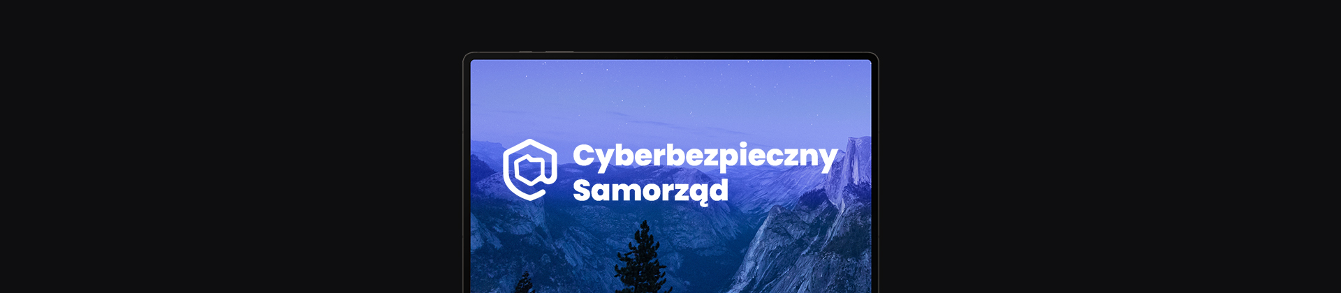 banner z ekranem laptopa, na nim logo Cyberbezpieczny Samorząd