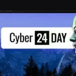 banner z laptopem i grafiką, sylwetka robota, logo Cyber24Day