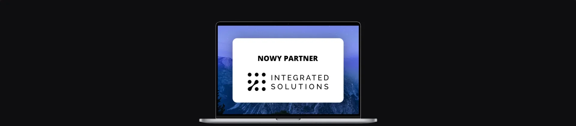 banner z ekranem laptopa, na nim logo firmy integrated solutions i napis "nowy partner"