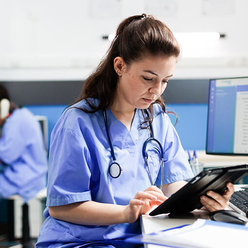 Proget mobility management for medical industry, doctor checks medical records on tablet