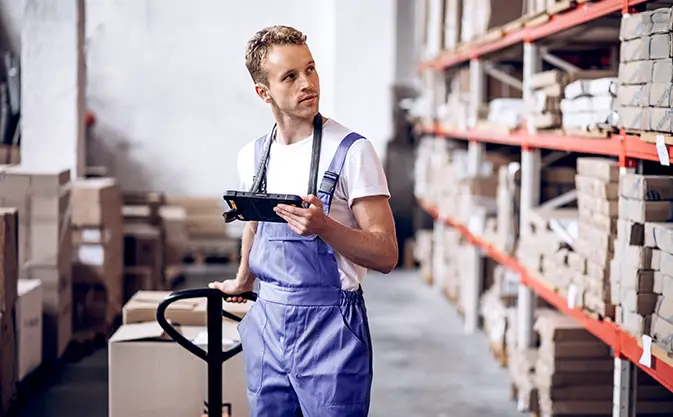 young man working in a warehouse