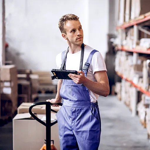 young man working in a warehouse